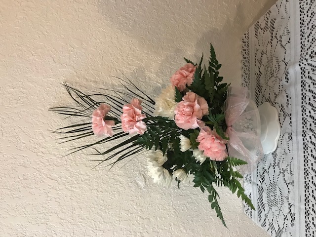 Pink and white pedestal arrangement