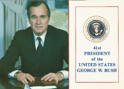 George Bush sitting at desk ostcard