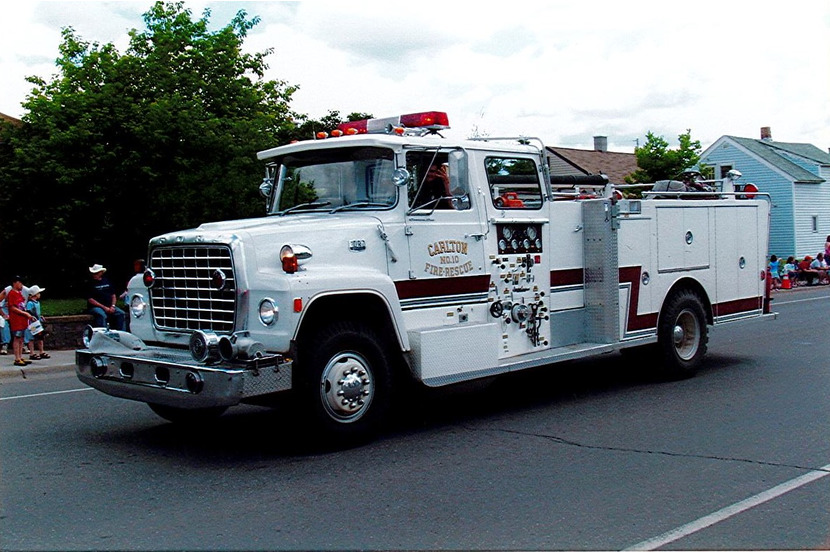 fire truck being driven in a parade