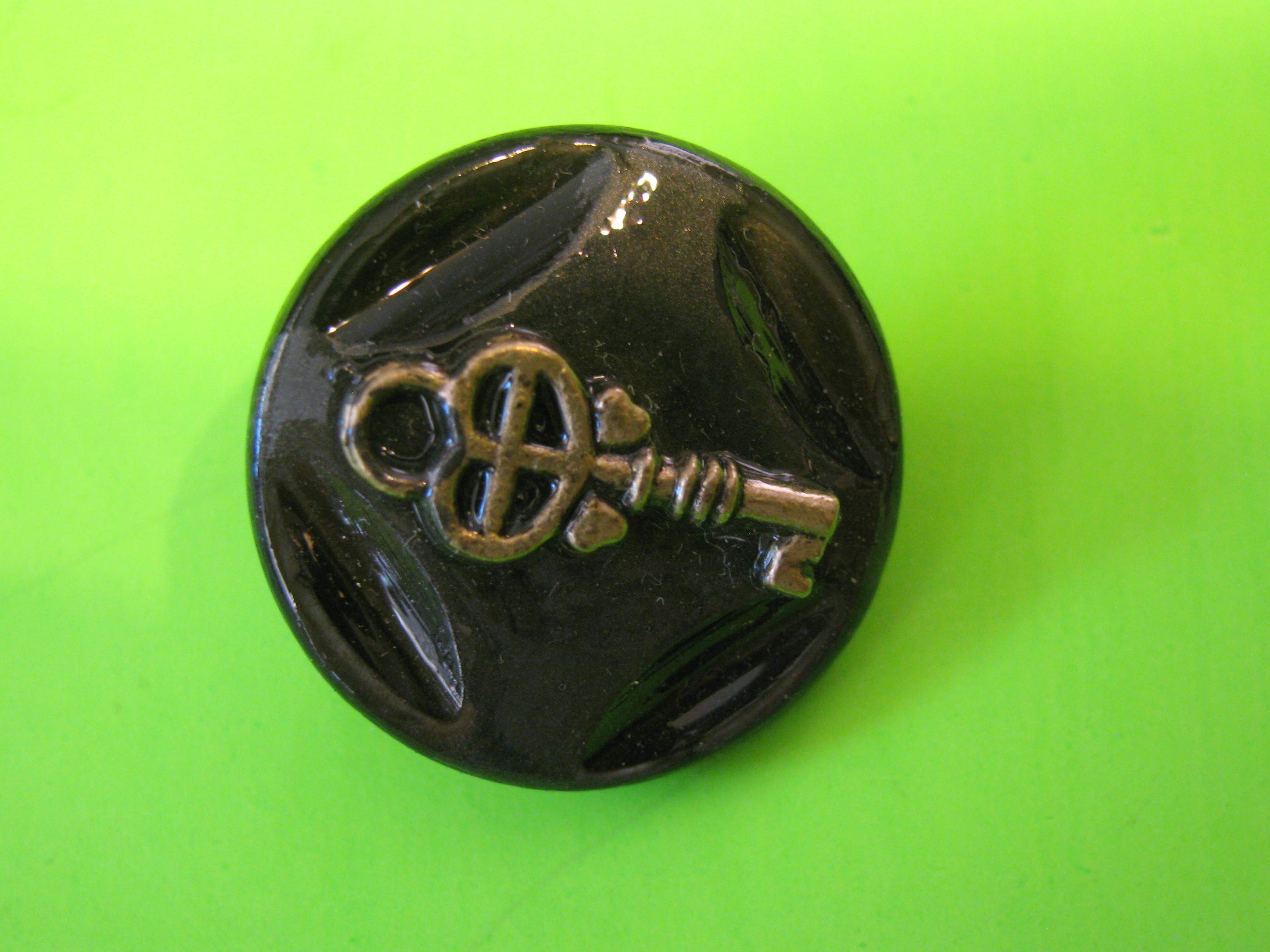 Antique Skeleton Key Centered on Round Mother of Pearl Button with Metal Loop Shank