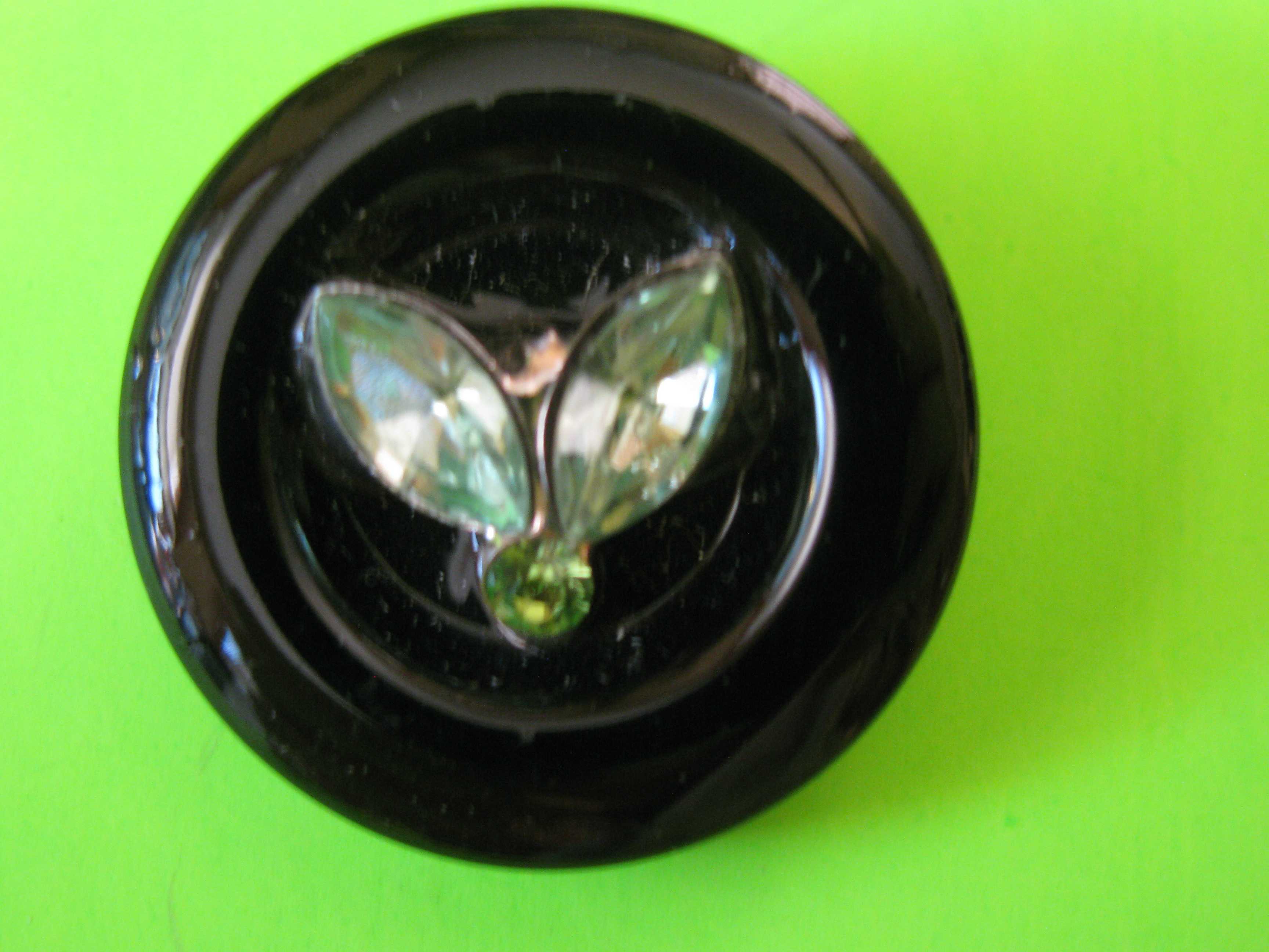 Tear Shaped Green Rhinestones and a Central Circular Rhinestone on Hard Plastic Button